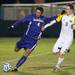 Wolverines forward James Murphy defensively plays against the Purple Eagles Roberto Andersson during the first half of Thursday nights game.Courtney Sacco I AnnArbor.com    